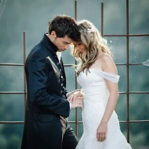 Cheerful Married Couple Near Old Building